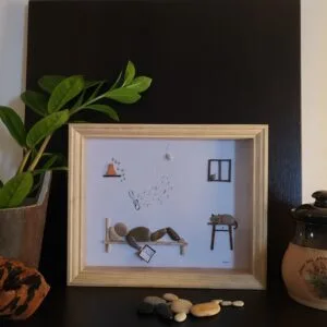 La Sieste, Cadre avec des Galets